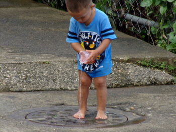 Full length of boy on floor