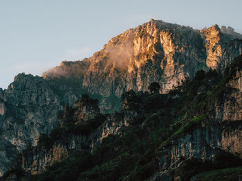 Scenic view of rocky mountains against clear sky