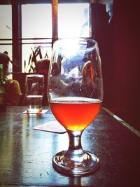 Close-up of beer in glass on table