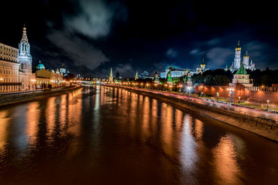 High angle view of moskva river with colorful lights reflection at night