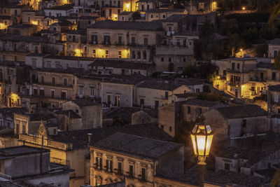 High angle view of illuminated buildings at night