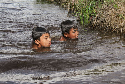 Portrait of boy in water