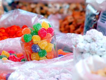 Close-up of colorful candies at market stall for sale