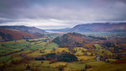 Scenic view of landscape and mountains against sky