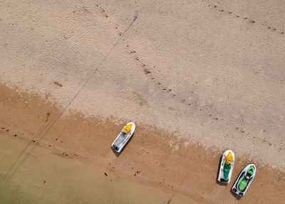 High angle view of boats moored at beach