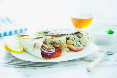Close-up of breakfast served on table