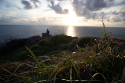 Scenic view of sea against sky during sunset