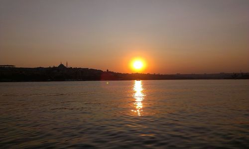 Scenic view of sunset over river