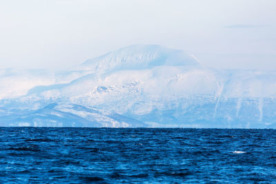 Scenic view of frozen sea against sky