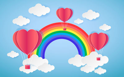 Multi colored balloons against blue sky