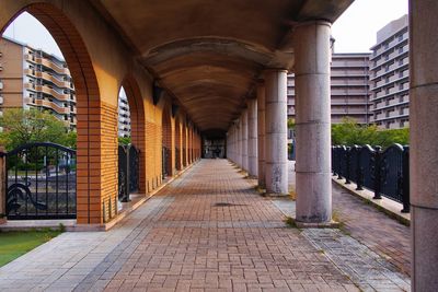 Empty corridor with columns along a bridge