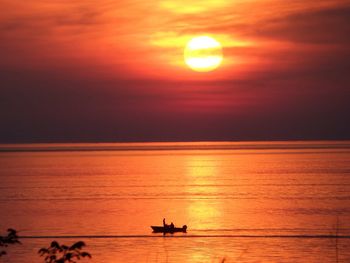 Scenic view of sea at sunset