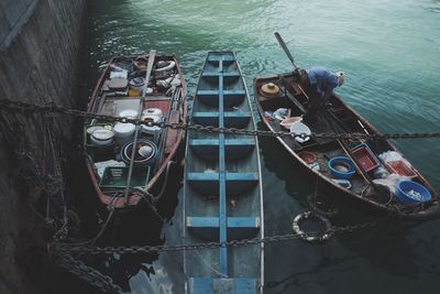 Boats moored in water