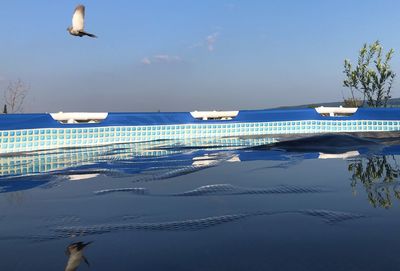 View of swimming pool against sky