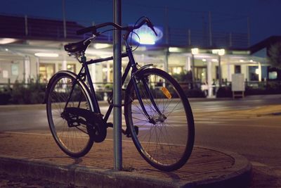 Bicycles on street at night