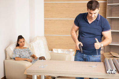 Side view of business colleagues working at home