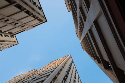 Low angle view of building against blue sky