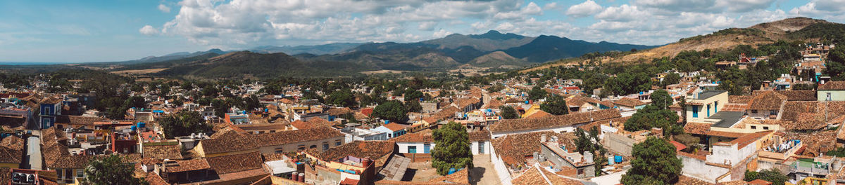 Panoramic view of town against sky