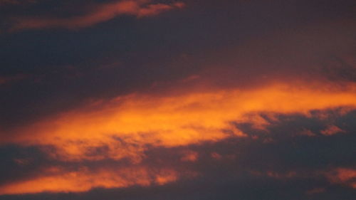 Low angle view of dramatic sky at sunset