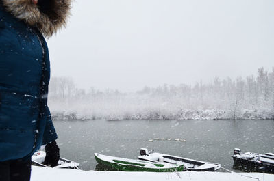 Scenic view of lake against sky during winter
