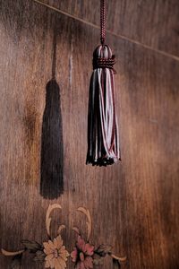 Close-up of clothes hanging on wood