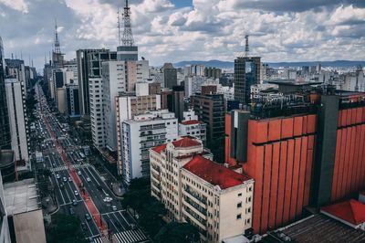 High angle view of buildings in city against sky