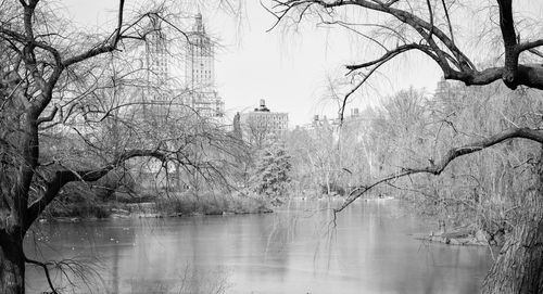 Lake in central park by the eldorado against sky