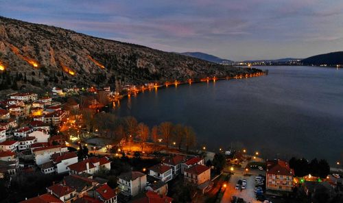 High angle view of illuminated buildings in town at night