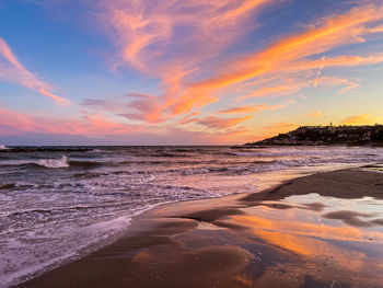 Scenic view of sea against sky during sunset