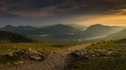 Scenic view of landscape against sky during sunset