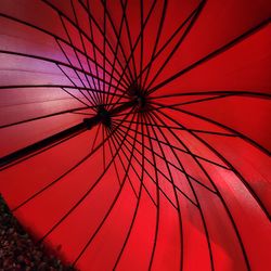 Low angle view of umbrella against sky