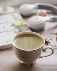 Close-up of coffee cup on table