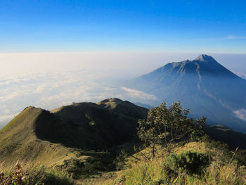 Panoramic view of mount merapi in yogyakarta, indonesia, with blue sky background