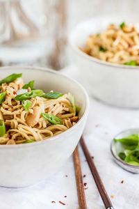 Close-up of fried noodles in bowl on table