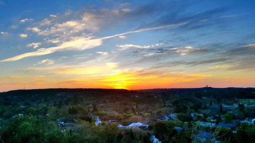 Scenic view of landscape at sunset