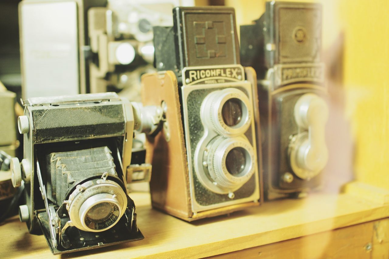 old-fashioned, retro styled, indoors, antique, close-up, no people, camera - photographic equipment, technology, table, vintage, day