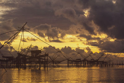 Scenic view of sea against dramatic sky