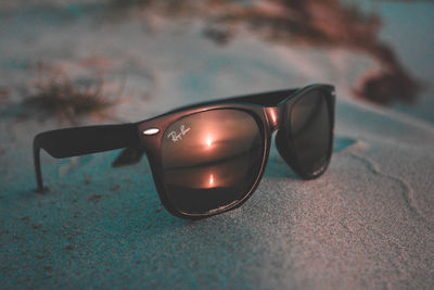 Close-up of sunglasses on table