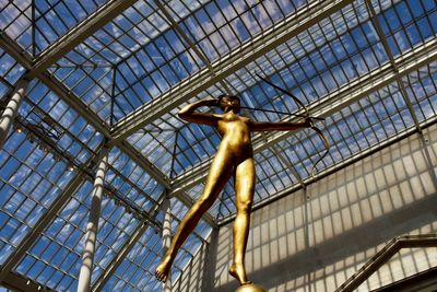 Low angle view of statue on ceiling