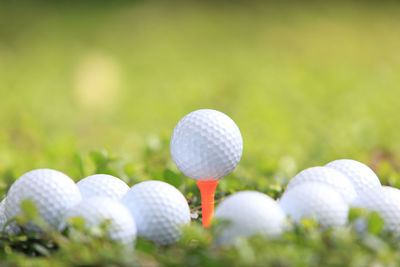 Close-up of white ball on grass