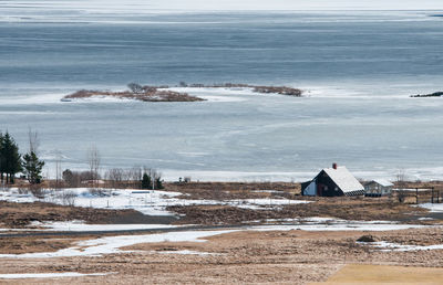 Scenic view of sea against sky during winter