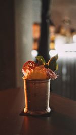 Close-up of ice cream in glass on table