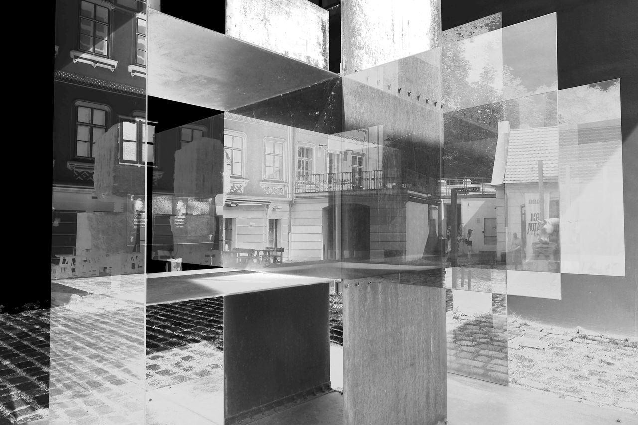 DIGITAL COMPOSITE IMAGE OF GLASS BUILDING