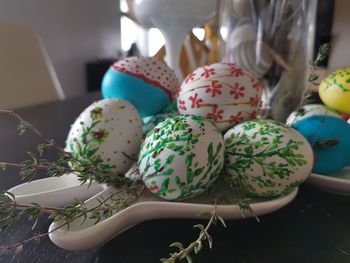 Close-up of multi colored candies on table