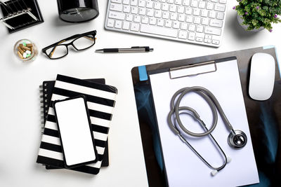 High angle view of smart phone on table
