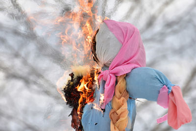 Scarecrow burning outdoors