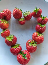 High angle view of strawberries on table