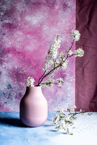 Close-up of flower vase on table