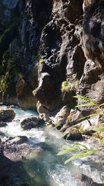 Scenic view of river amidst rocks
