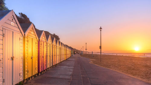 Beach huts on southbourne beach at sunrise